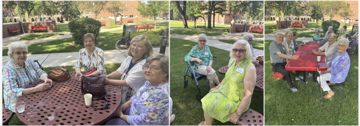 Four St. Francis School of Nursing alumni sitting at a table outside.