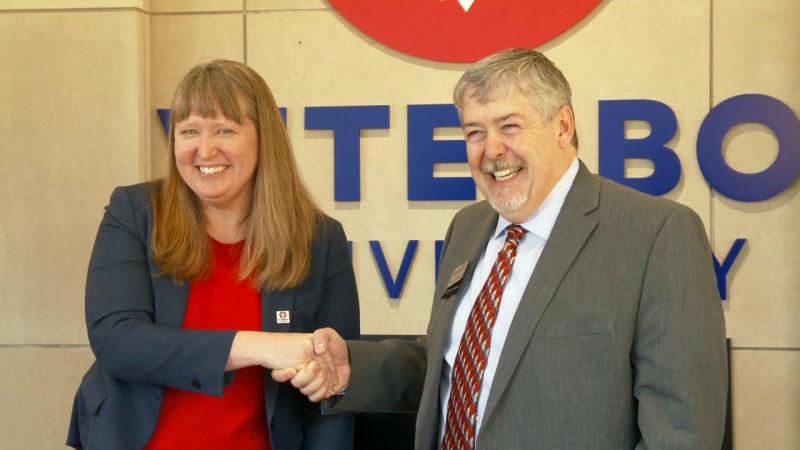 Viterbo University President Glena Temple and Western Technical College President Roger Stanford celebrate the recent signing of a co-admission agreement between the two institutions.