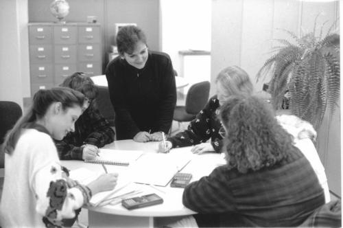 Jane Eddy works with students in the earlier days of Viterbo's Academic Resource Center.