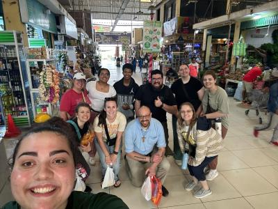 The Viterbo University group visited a market in Lurin, Peru, guided by a Casa Hogar graduate named Leonardo (back row, center, in photo above), who will be coming to Viterbo to study in the fall.