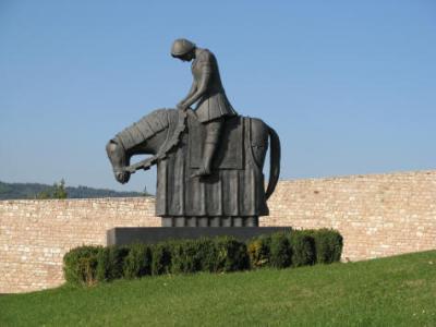 This statue in front of the Basilica of St. Francis in Assisi, Italy, depicts the moment when young Francis heard the voice of God telling him to leave the war and return home. 