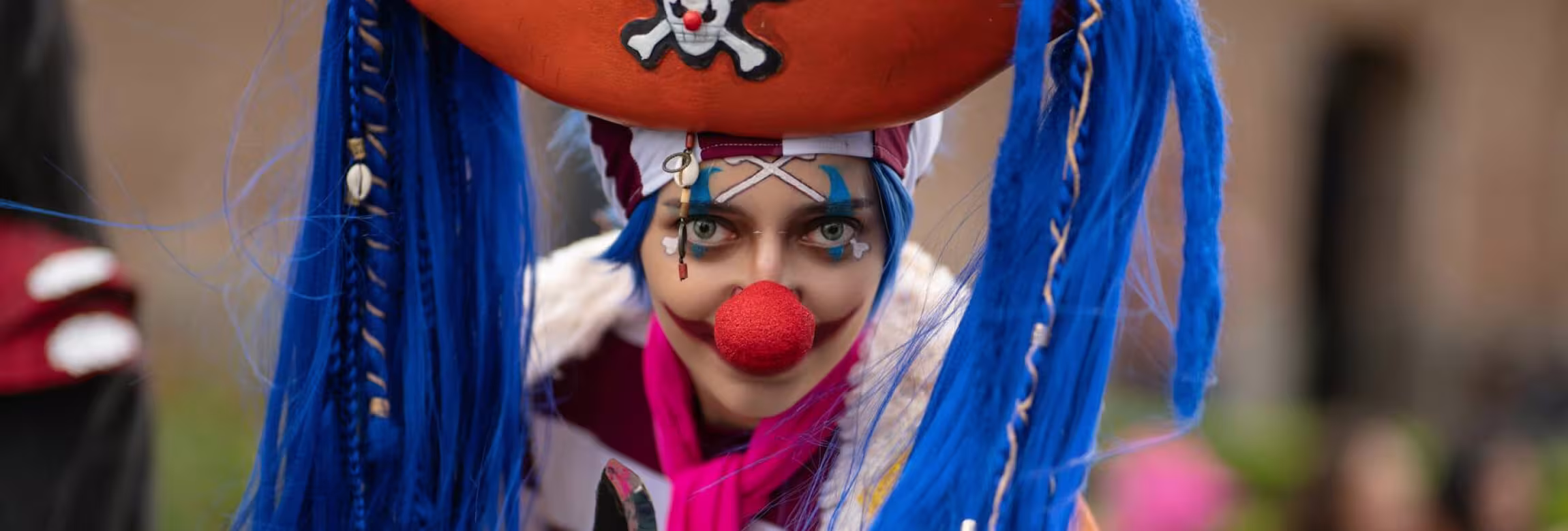 a clown looking at you