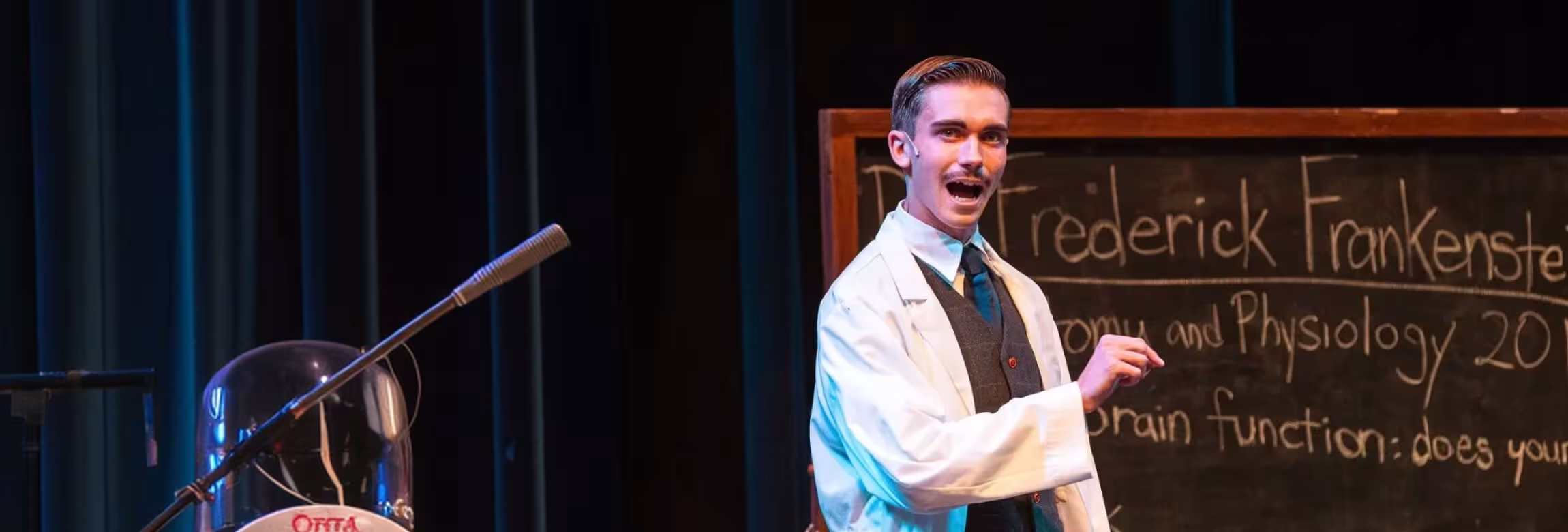 professor at the chalkboard