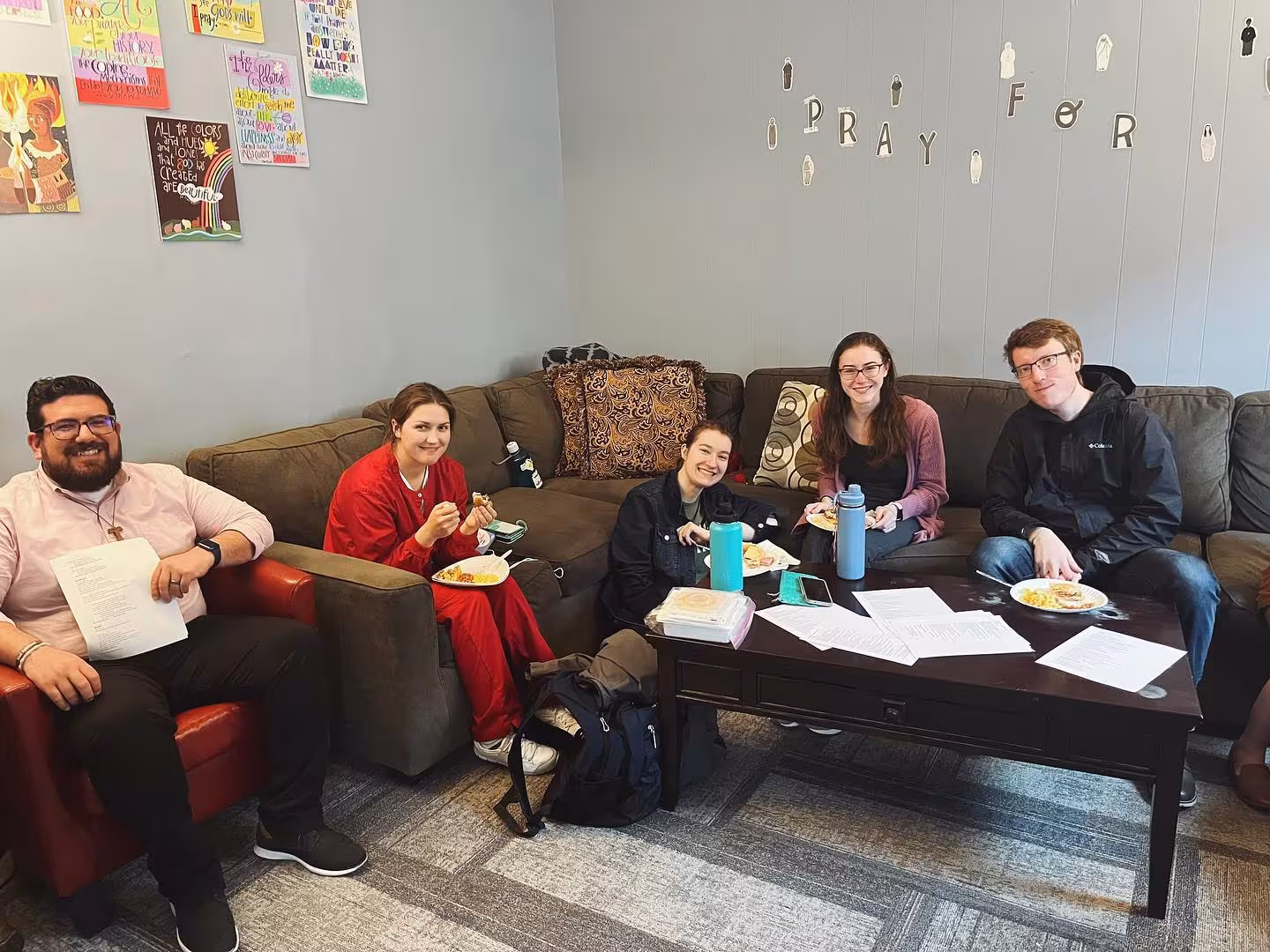 Students sitting on a couch at the Sr Thea Bowman Center on campus